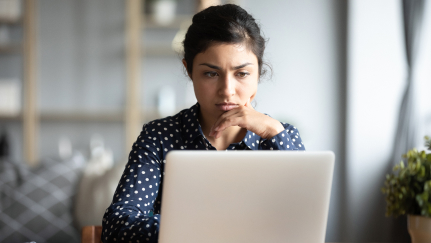 Woman looking at a laptop
