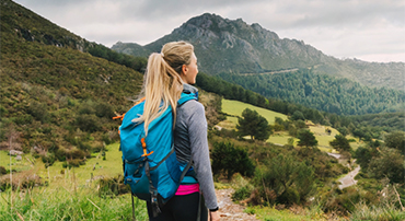 a hiker deciding which trail to take